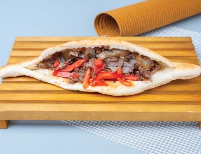 Beef shawarma sandwich in Iraqi samoon bread