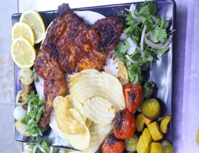 One portion of charcoal-grilled chicken