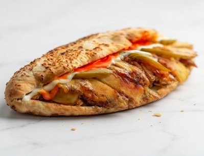 Chicken shawarma sandwich in a bun