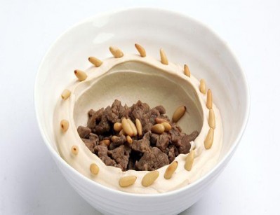 Pureed chickpeas with tahini, topped with fresh fried lamb.