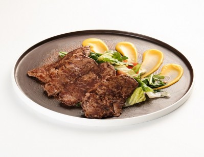 Western-style meal: beef steak with sauce.